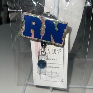 RN acrylic badge reel - new in package.